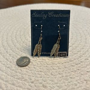 Sterling Silver double feather earrings on french wire